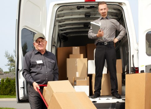 Removal team preparing a Marylebone flat move in a central London street