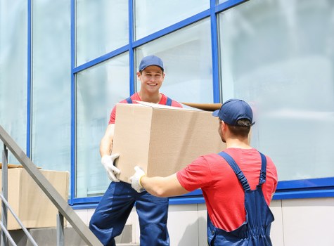 Packed office equipment and furniture prepared for relocation in Marylebone