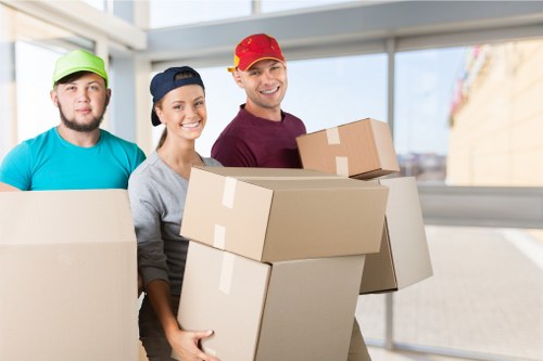 Local removals crew handling office furniture in Marylebone