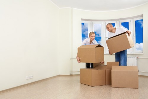 Professional movers handling furniture in a Marylebone townhouse