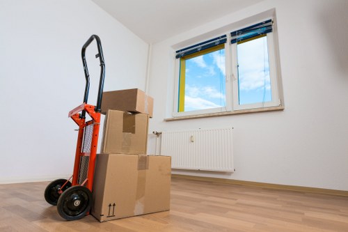 Packed household boxes and furniture ready for a Marylebone relocation